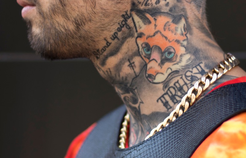 Fox side neck tattoo