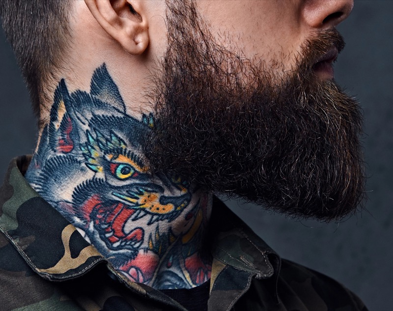 Wolf side neck tattoo