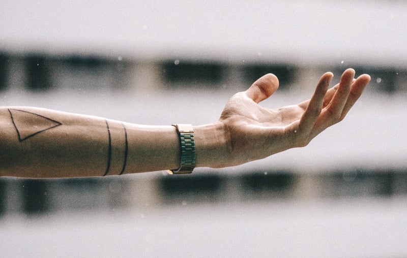 Minimalist forearm tattoo