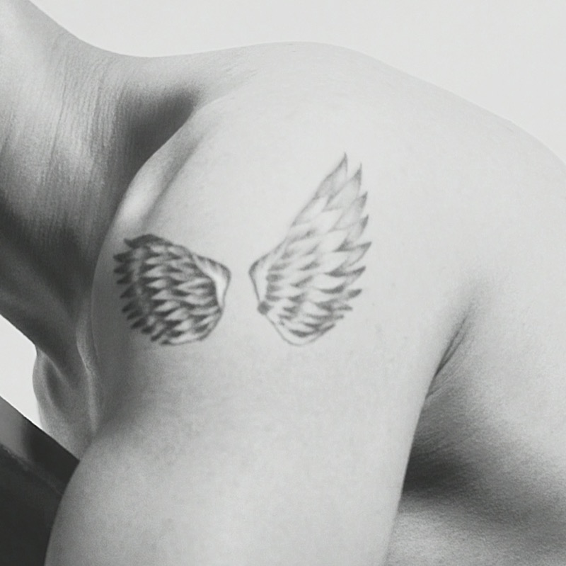 Angel wings small shoulder tattoo