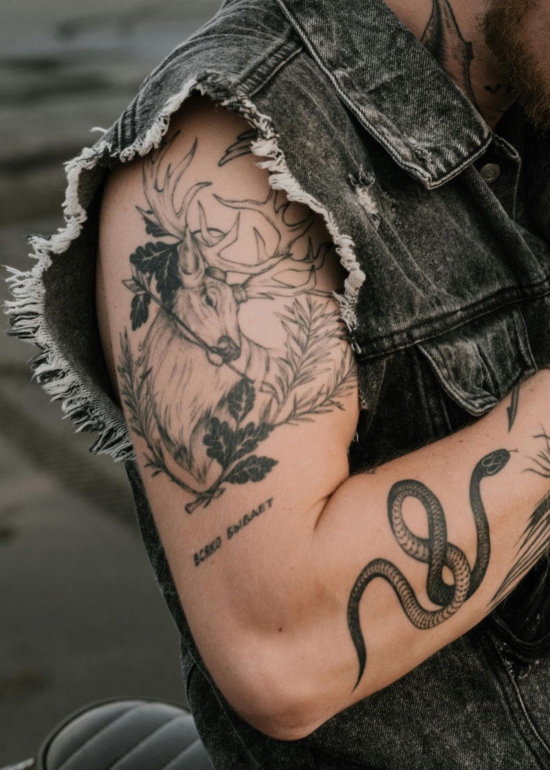 Illustrative shoulder tattoo