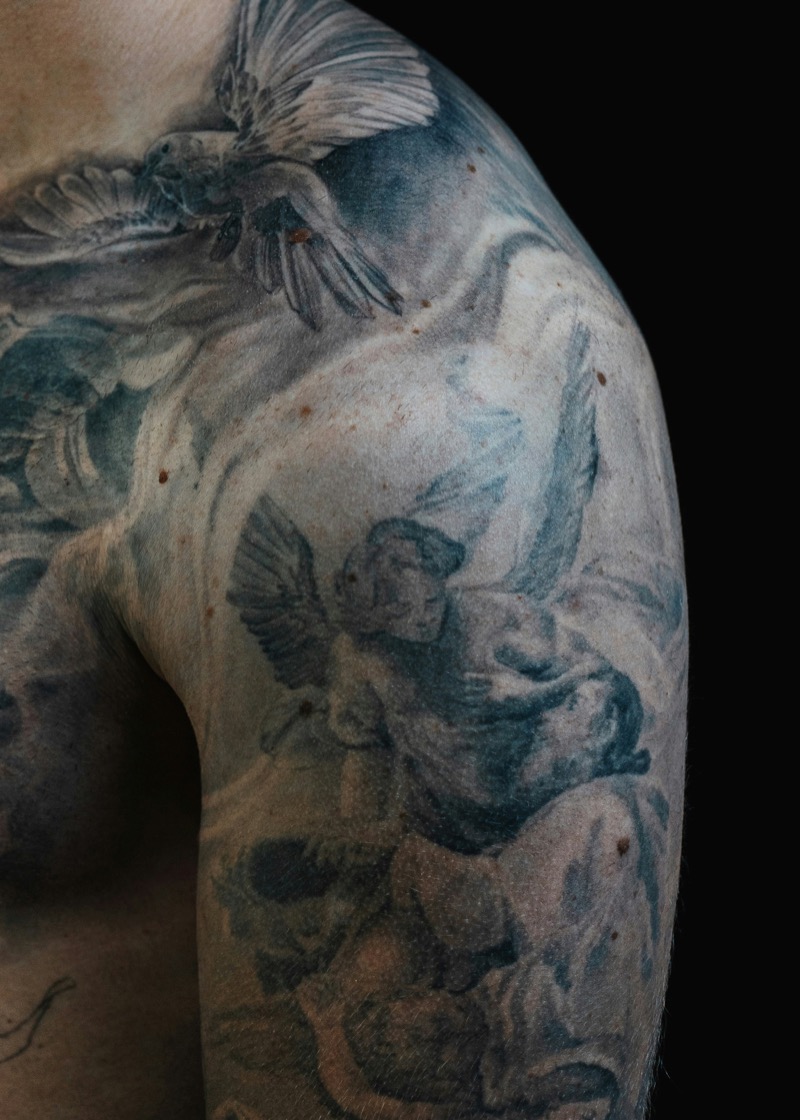 Religious shoulder tattoo