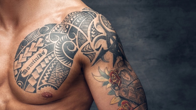 Shoulder to chest tattoo neo tribal