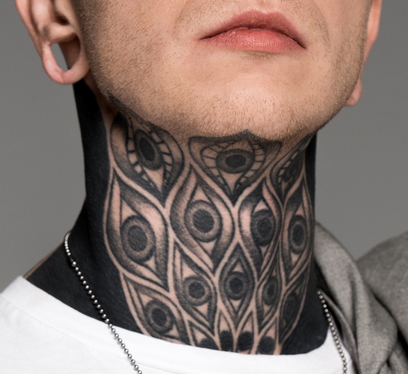 Blackwork neck tattoo