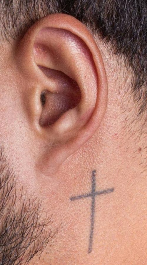 Fine Line Cross Behind Ear Tattoo