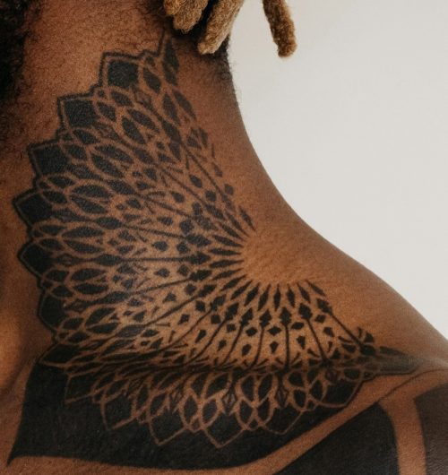 Geometric Mandala Neck Tattoo