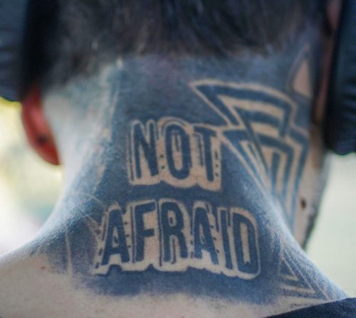 Not Afraid Neck Lettering Tattoo