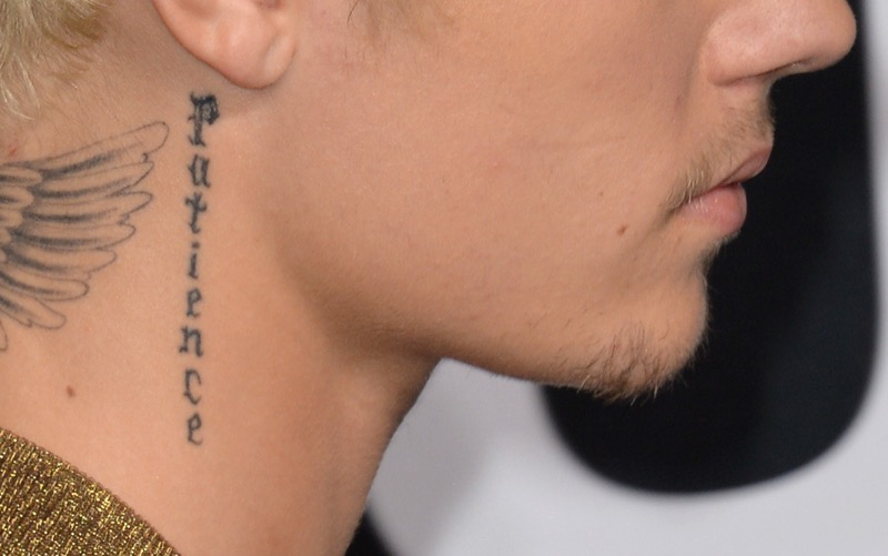 Justin Bieber's side neck lettering tattoo