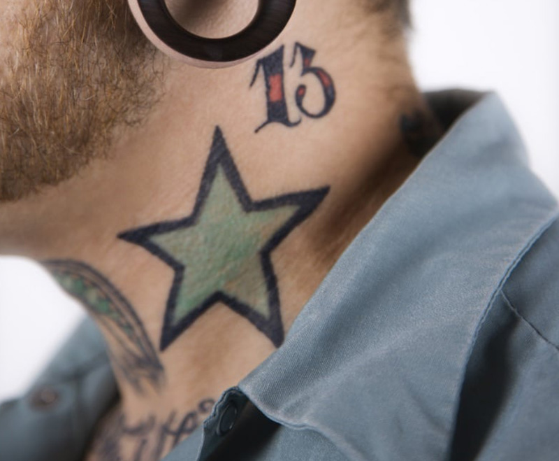 Lucky number 13 neck tattoo