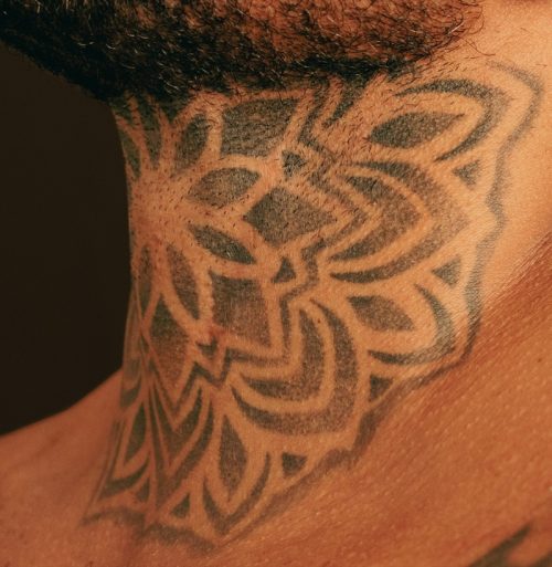 Blackwork Mandala Neck Tattoo