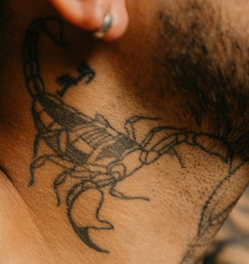 Fine Line Scorpion Neck Tattoo