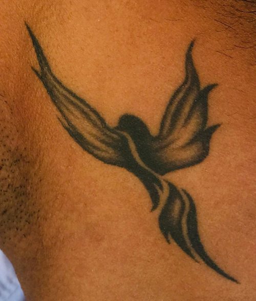 Tribal Phoenix Neck Tattoo