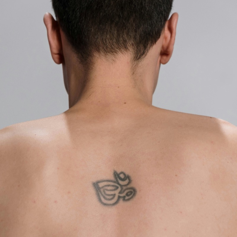 aged small tattoo back men