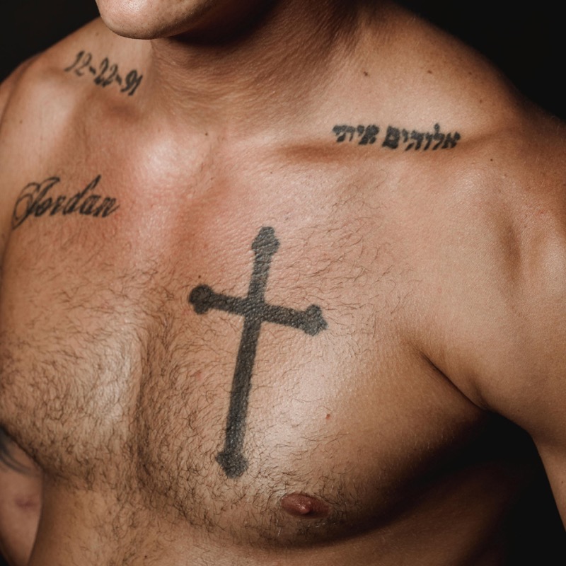 center chest cross religious tattoo men