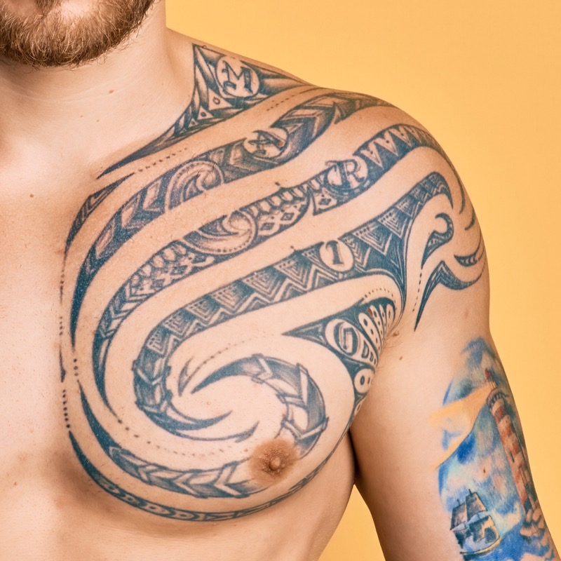 Chest shoulder wrap tattoo polynesian