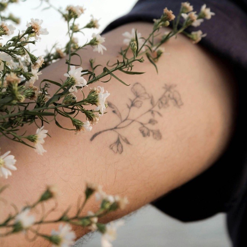 fine line floral tattoo men