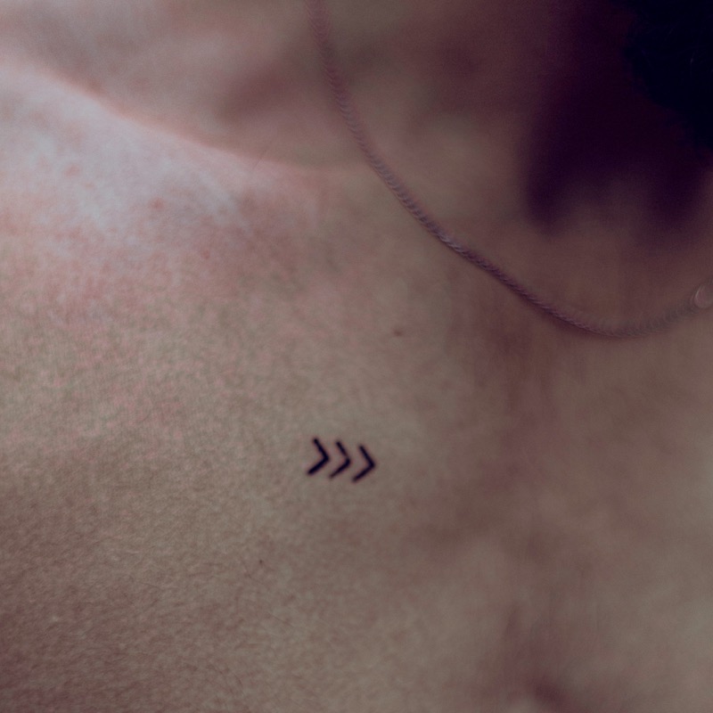 minimalist chevron chest tattoo men