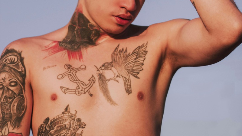 patchwork multi piece chest tattoo men