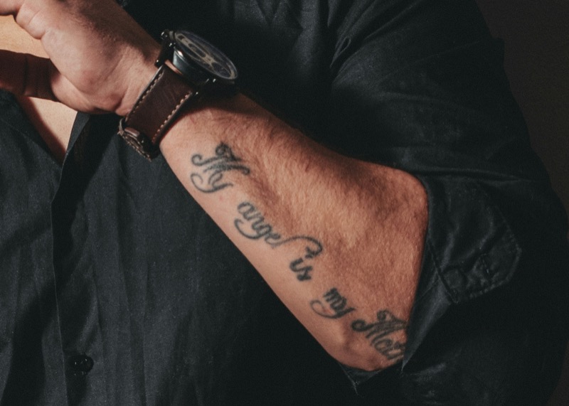 Script forearm tattoo