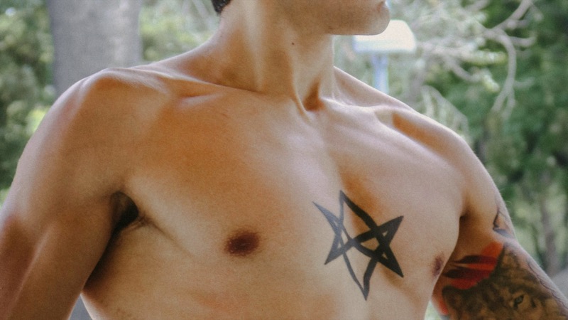 single pec star chest tattoo men
