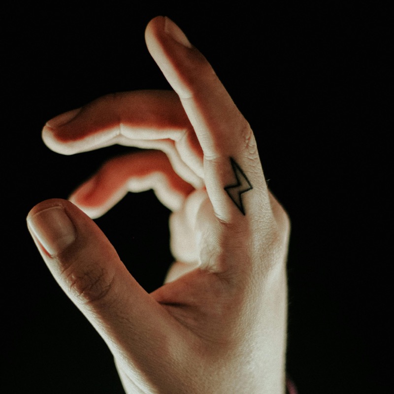 small lightning finger tattoo men