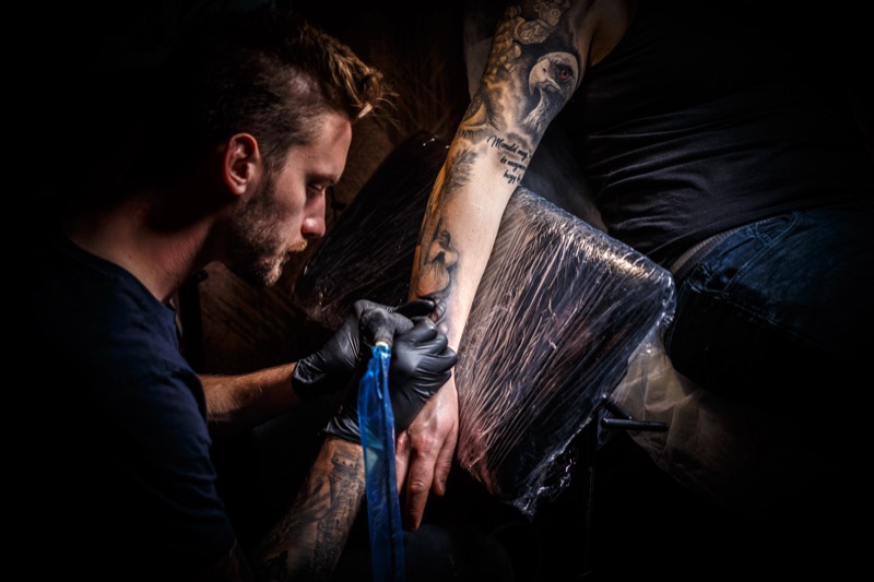 Tattoo artist with beard