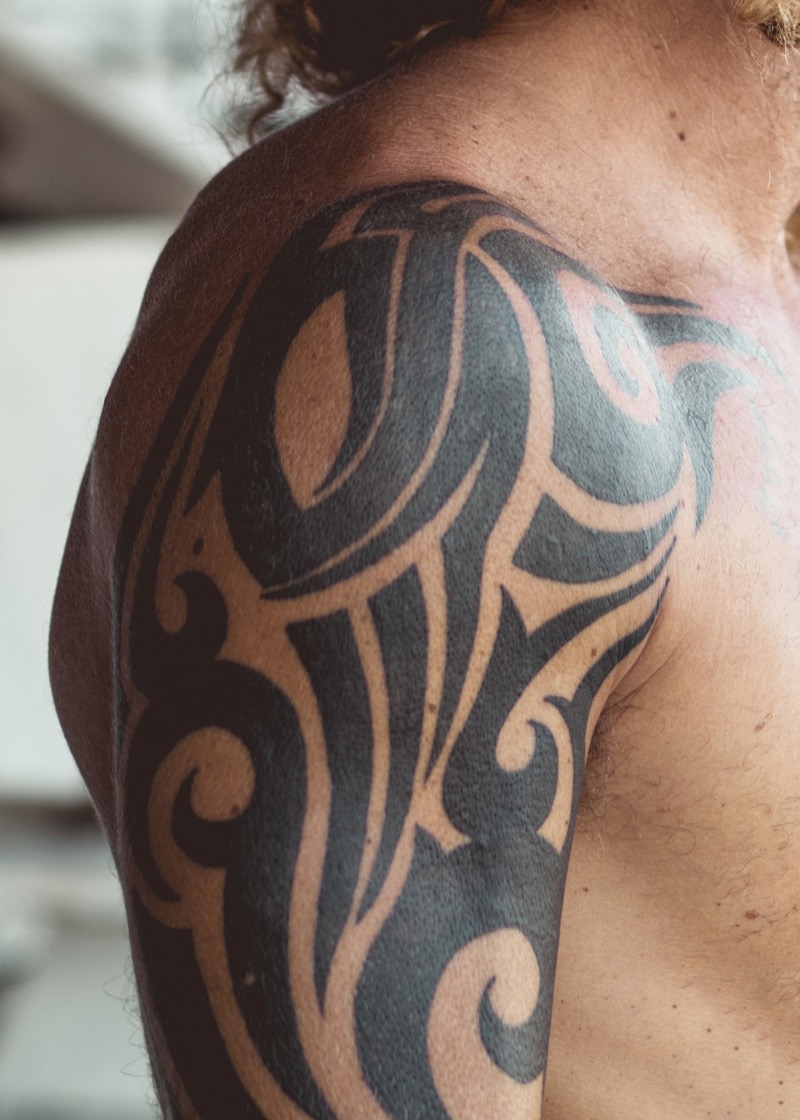 Tribal blackwork shoulder tattoo